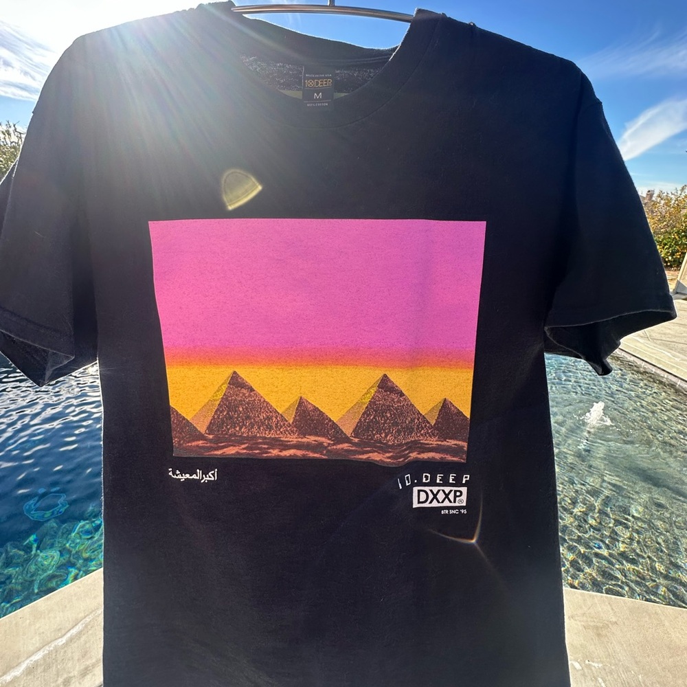 10.Deep Black Tee withPyramid Graphic